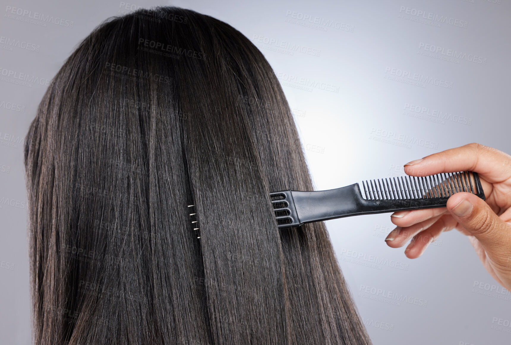 Buy stock photo Studio shot of a woman with healthy brown hair