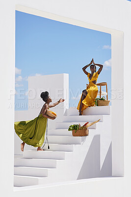 Buy stock photo Shot of two beautiful women posing on a staircase  outside