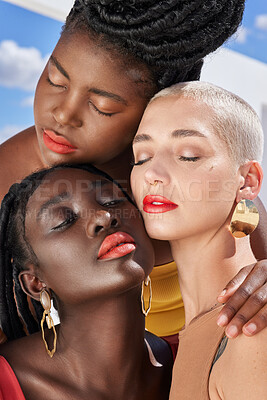 Buy stock photo Cropped shot of three attractive young women posing on a rooftop outdoors