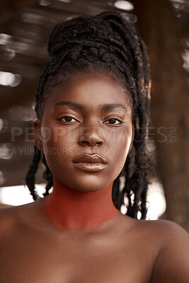 Buy stock photo Shot of a beautiful young traditional woman posing outside