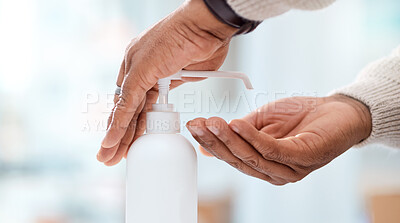 Buy stock photo Closeup shot of an unrecognisable man using hand sanitiser