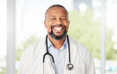 Buy stock photo Shot of a doctor standing in a modern office