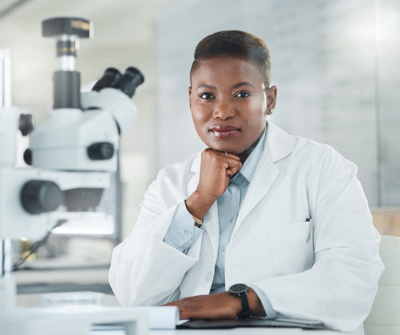 Buy stock photo Portrait of a young woman working in a lab