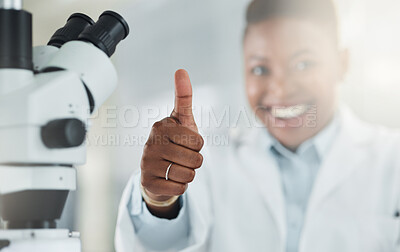 Buy stock photo Shot of a scientist showing thumbs up in a lab