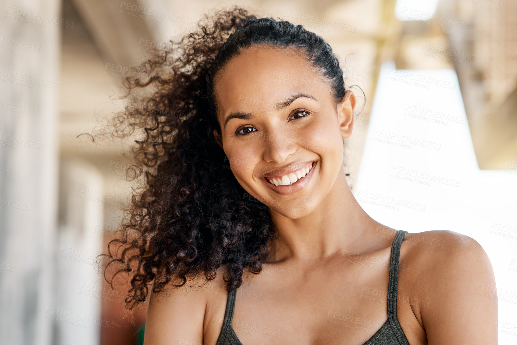 Buy stock photo Shot of an attractive young woman standing alone in the city during her outdoor workout