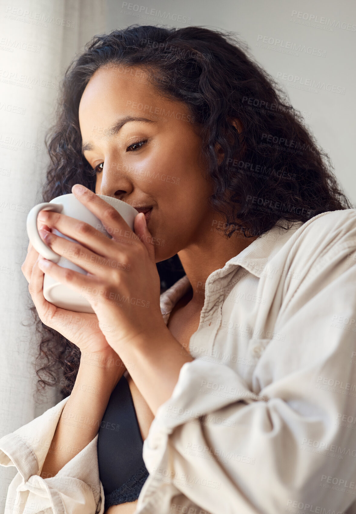 Buy stock photo Woman, drinking coffee and thinking at window in home with  aroma, flavor and perspective with break. Person, happy and reflection with beverage, tea and inspiration with morning routine at apartment