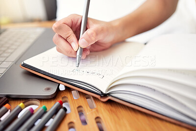 Buy stock photo Shot of an unrecognizable person writing in a book at home