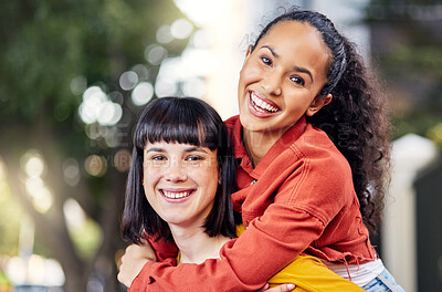 Buy stock photo Couple of friends, lesbian and piggyback portrait outdoor for fun, travel and happiness or love on vacation. Young people in city for holiday or playful trip with a smile and joy to hangout in summer