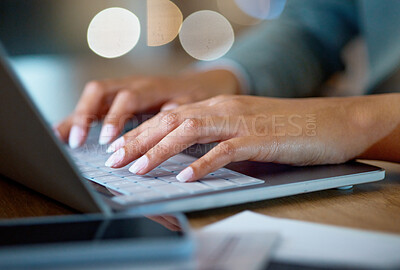 Buy stock photo Cropped shot of an unrecognizable businesswoman working late at her company offices