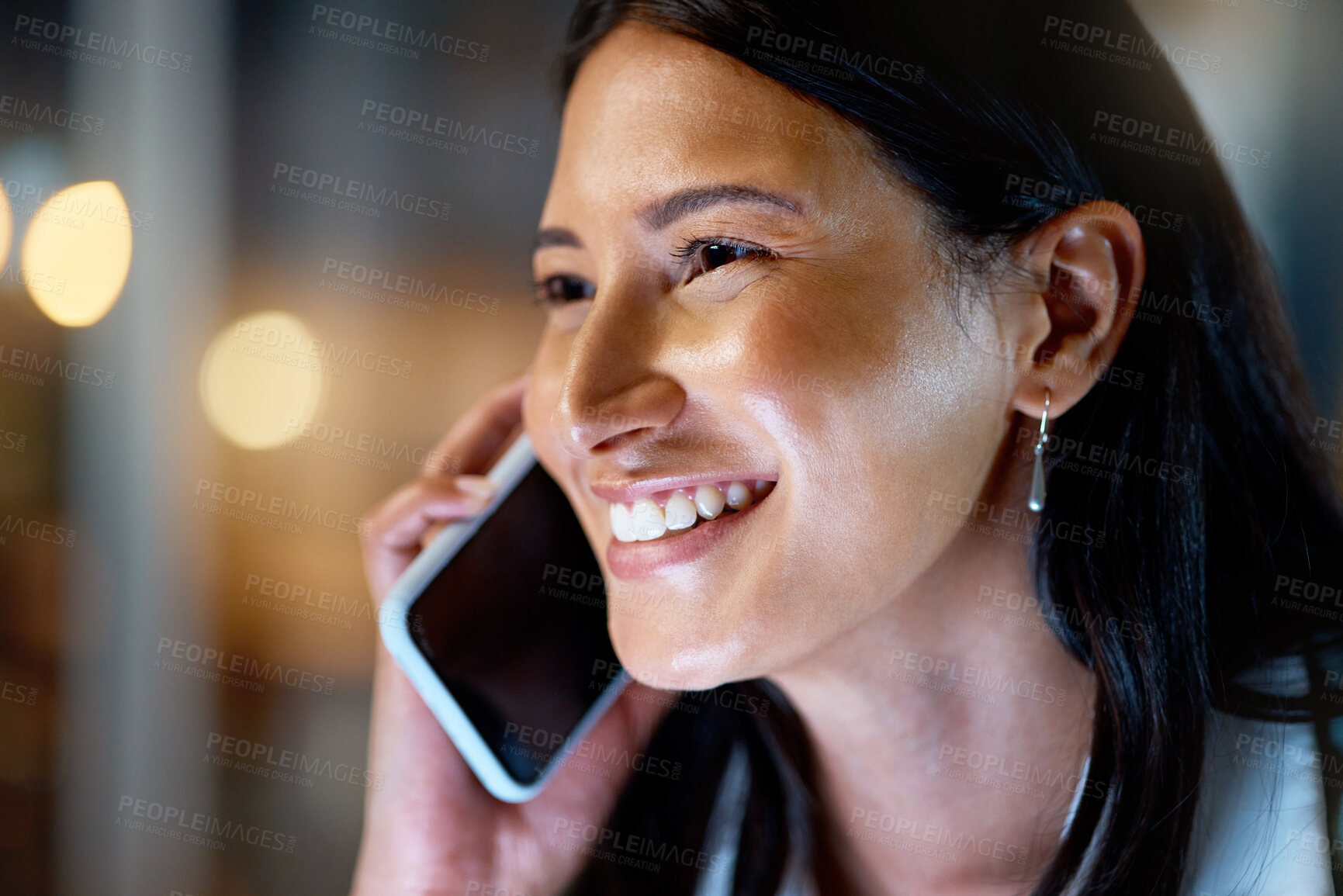 Buy stock photo Cropped shot of an attractive young businesswoman working late at her company offices