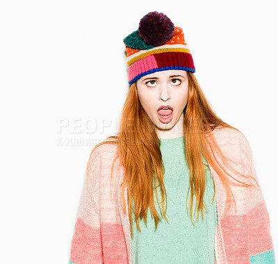 Buy stock photo Girl, winter fashion and wow in studio with casual outfit to keep warm of cold weather and wardrobe for season. Female person, shock and big eyes with white background, beanie and silly face.