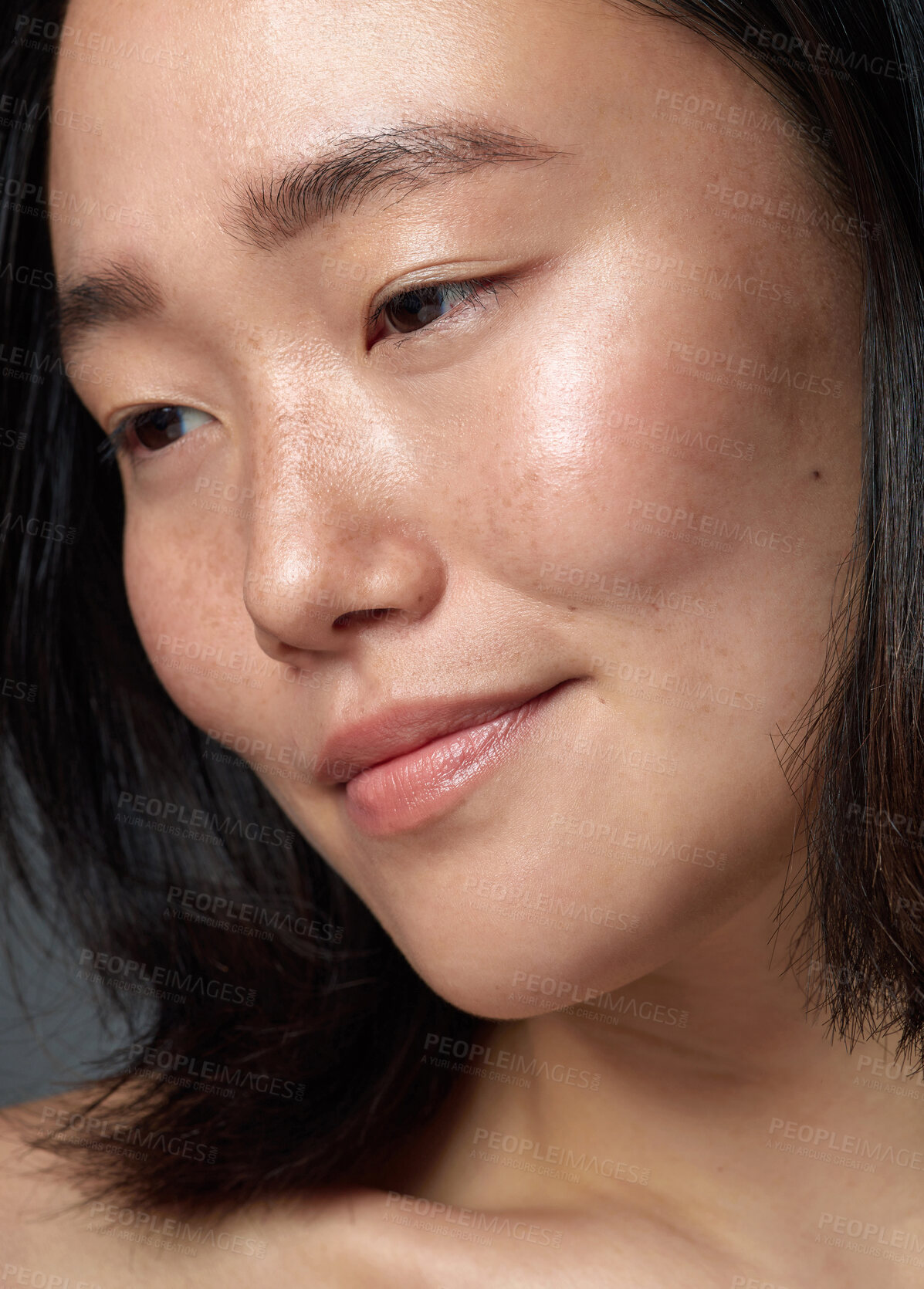 Buy stock photo Closeup shot of a beautiful young woman with freckles on her face