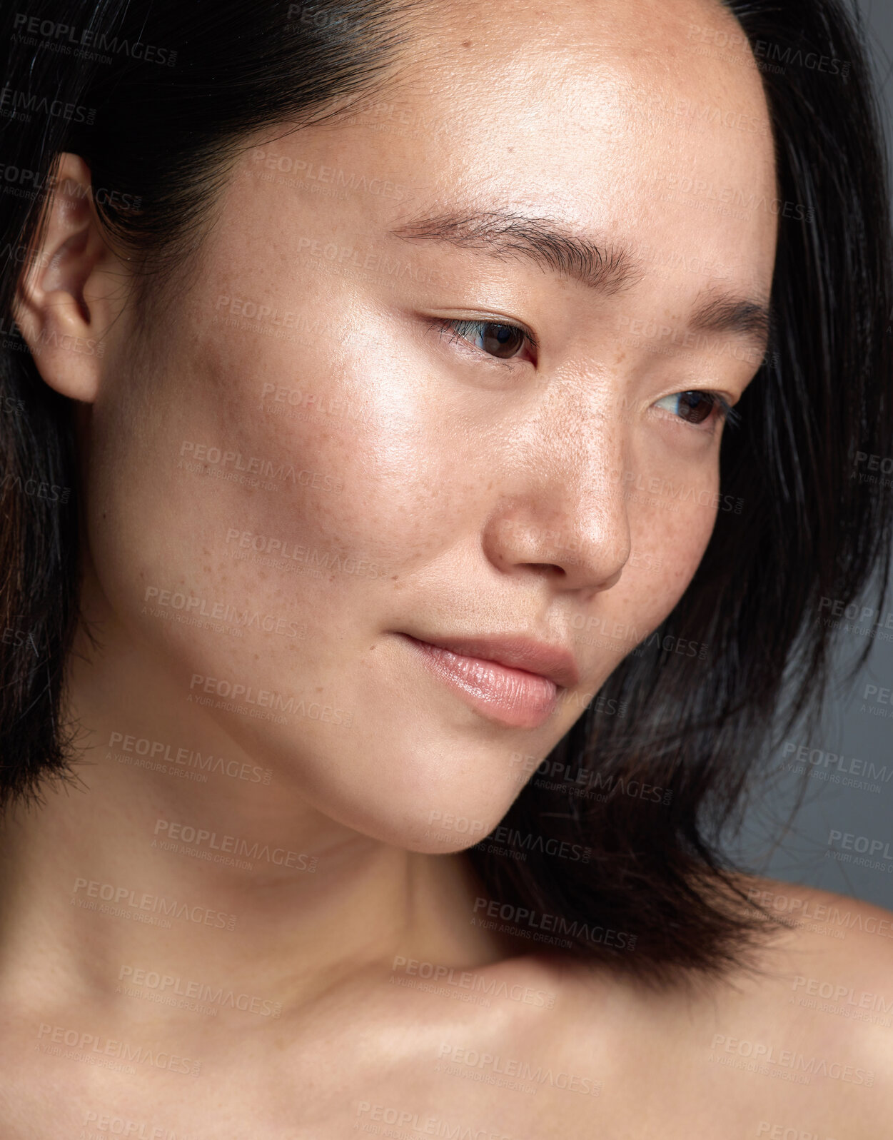 Buy stock photo Closeup shot of a beautiful young woman with freckles on her face