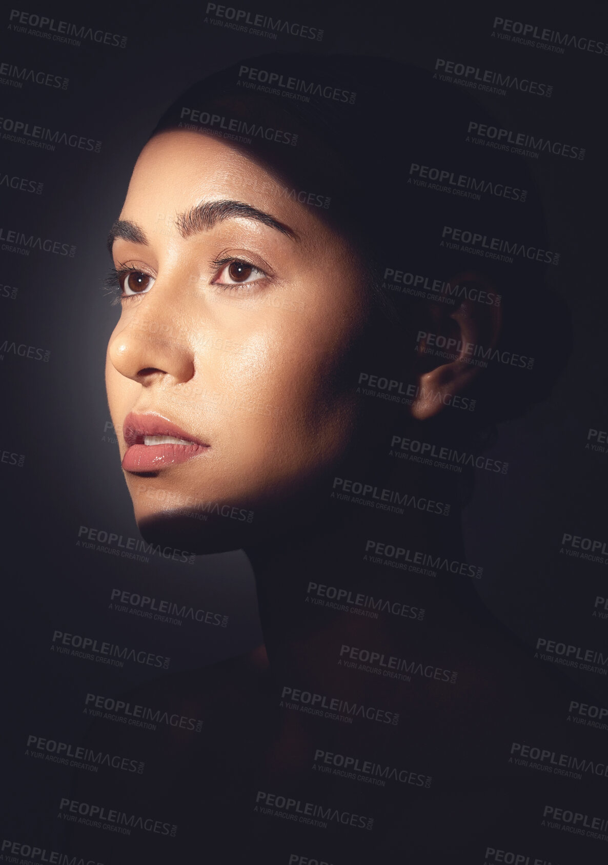 Buy stock photo Thinking, woman and skincare with shadow in studio for beauty, hydrated skin and natural shine. Reflection, female person and cosmetics with light, dermatology and facial treatment on dark background