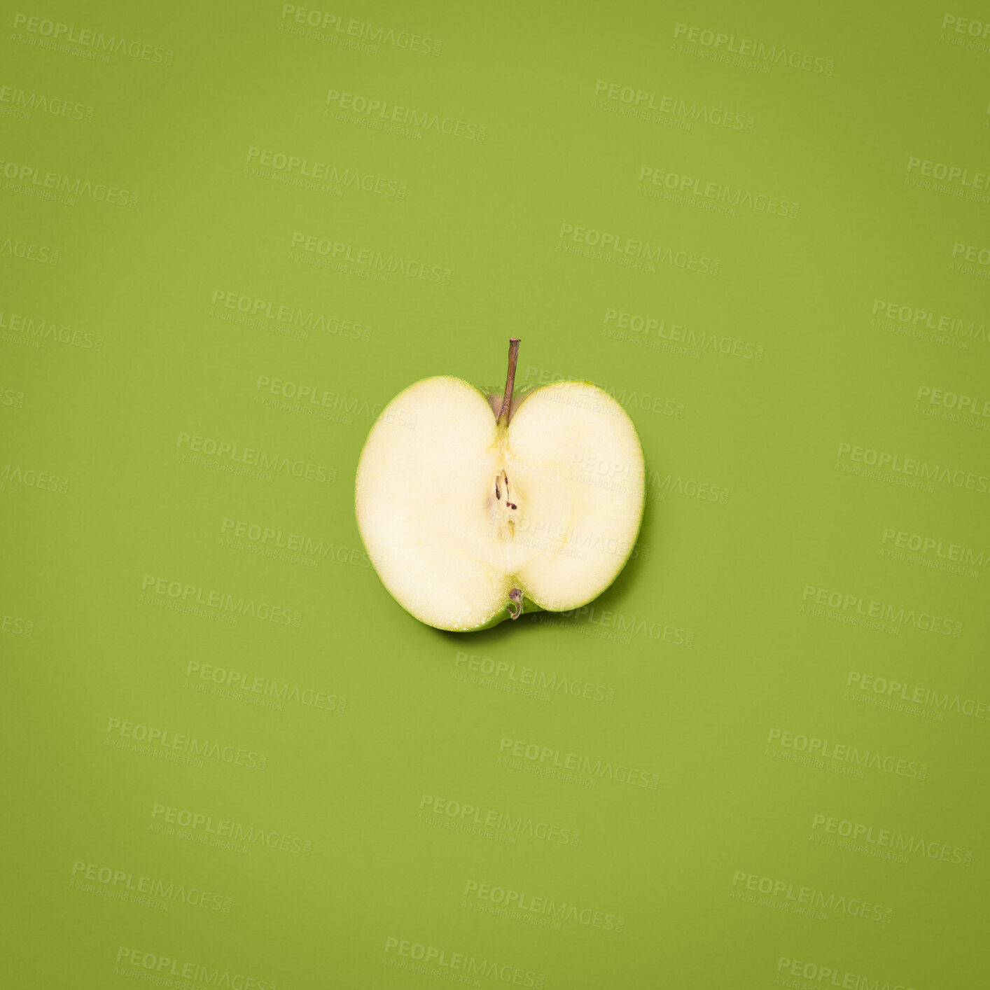 Buy stock photo Apple, stem and nutrition and by green background for wellness, vitamin c and minerals by mockup space. Organic fruit, vegan breakfast and healthy snack by backdrop for fiber, aid digestion or studio