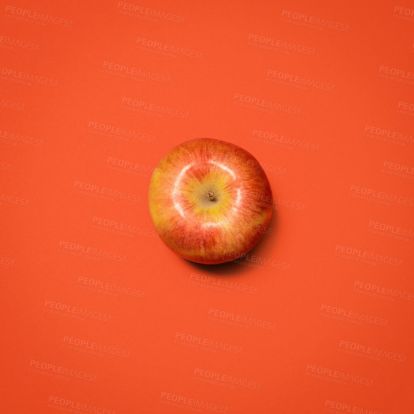 Buy stock photo Above, apple and fresh in studio for nutrition, healthy eating and gut health. Fruit, produce or snack on red background for fiber, digestion aid or antioxidants in diet with sweet food with juice