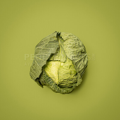 Buy stock photo Crop, cabbage and healthy in studio, vegetable and space for food, nutrition and diet with vitamin. Green background, raw and organic for dinner of salad, meal or wellness for menu of vegan in mockup