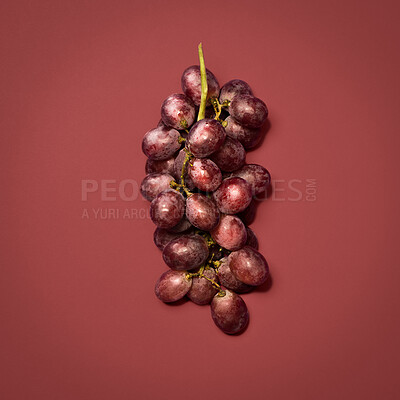 Buy stock photo Grapes, fruit and studio on background as ingredient for snack, nutrition and diet. Food, organic and natural with healthy meal for wellness, health and self care with vitamins and wellbeing