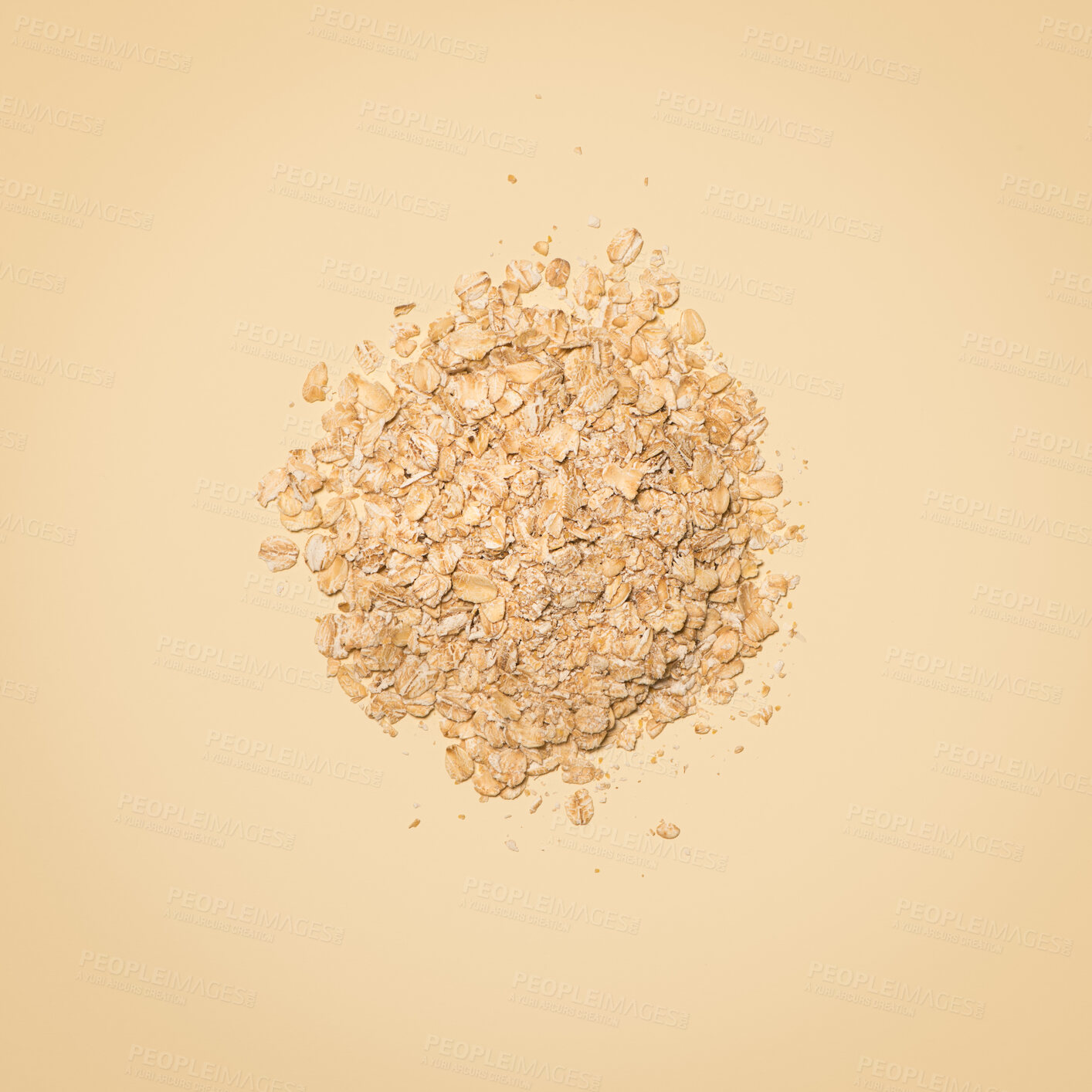 Buy stock photo Above, oats and pile on studio background for food, nutrients and gut health. Grain, organic and fiber for digestion with antioxidants, carbohydrates and ingredient for savoury meal or breakfast