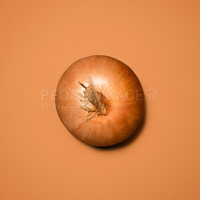 Buy stock photo Shot of an onion against a studio background