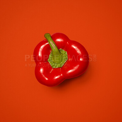 Buy stock photo Red pepper, nutrition and isolated by studio background for wellness, vitamin c and minerals by mockup space. Sweet vegetable, vegan breakfast and organic snack by backdrop, fiber and aid digestion