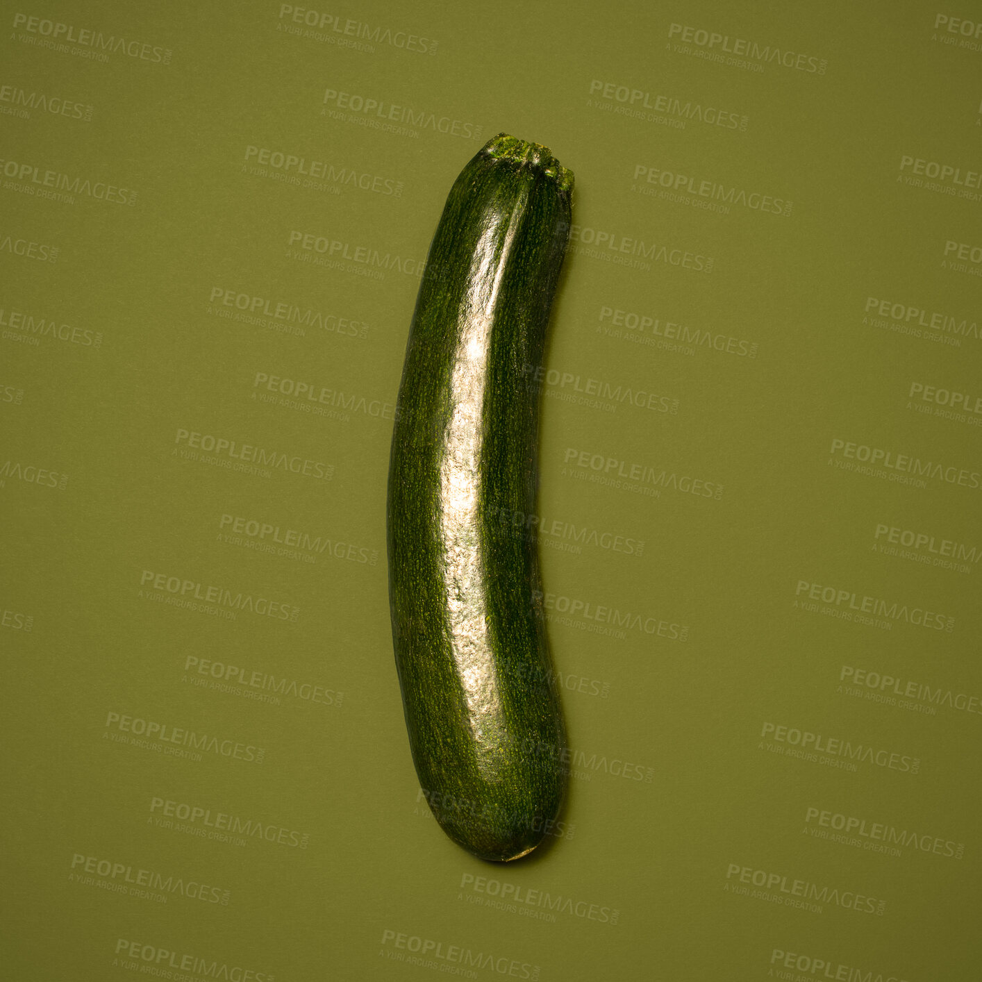 Buy stock photo Shot of a green marrow against a studio background