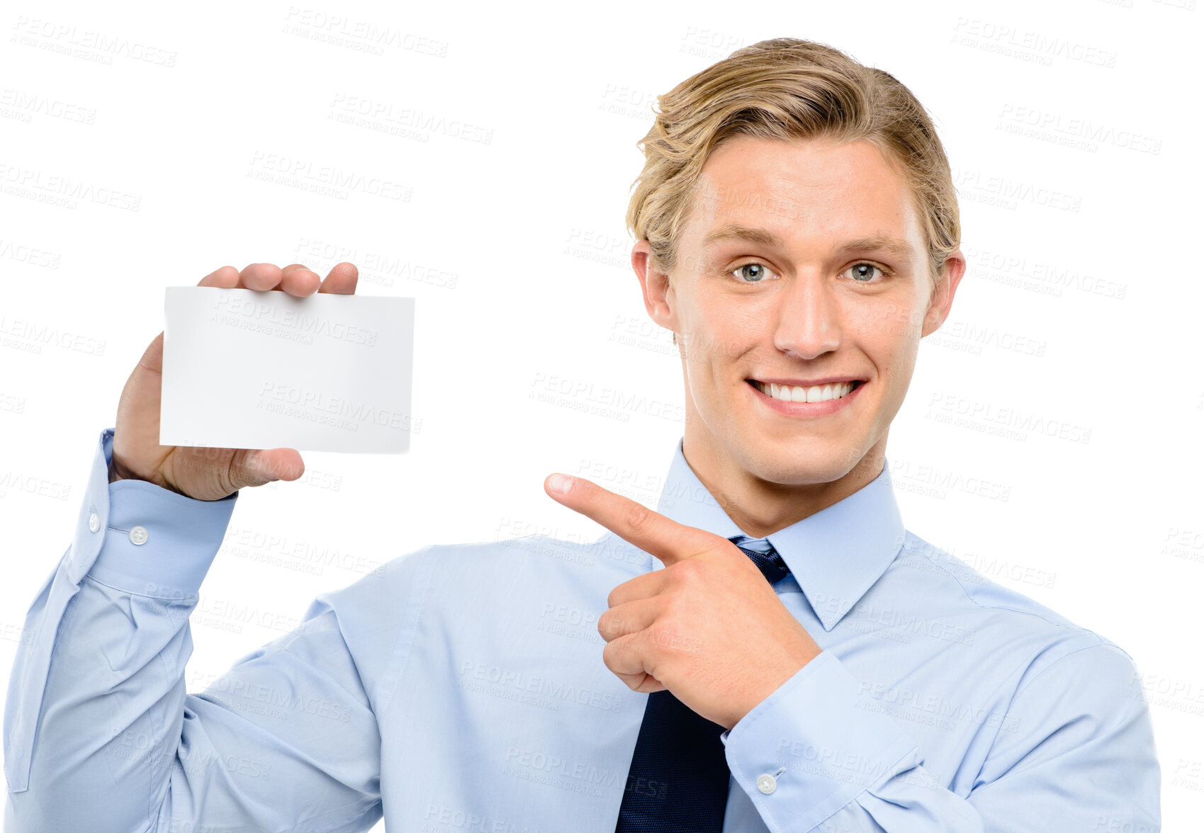 Buy stock photo Shot of a handsome young businessman standing alone in the studio and pointing at a promotion