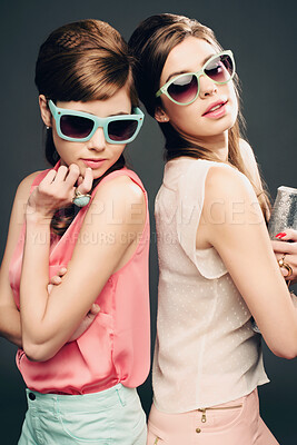 Buy stock photo Fashion, beauty and retro with portrait of women in studio for elegant, pastel and vintage. Sunglasses, confident and cosmetics with female model on dark background for glamour, beehive and style