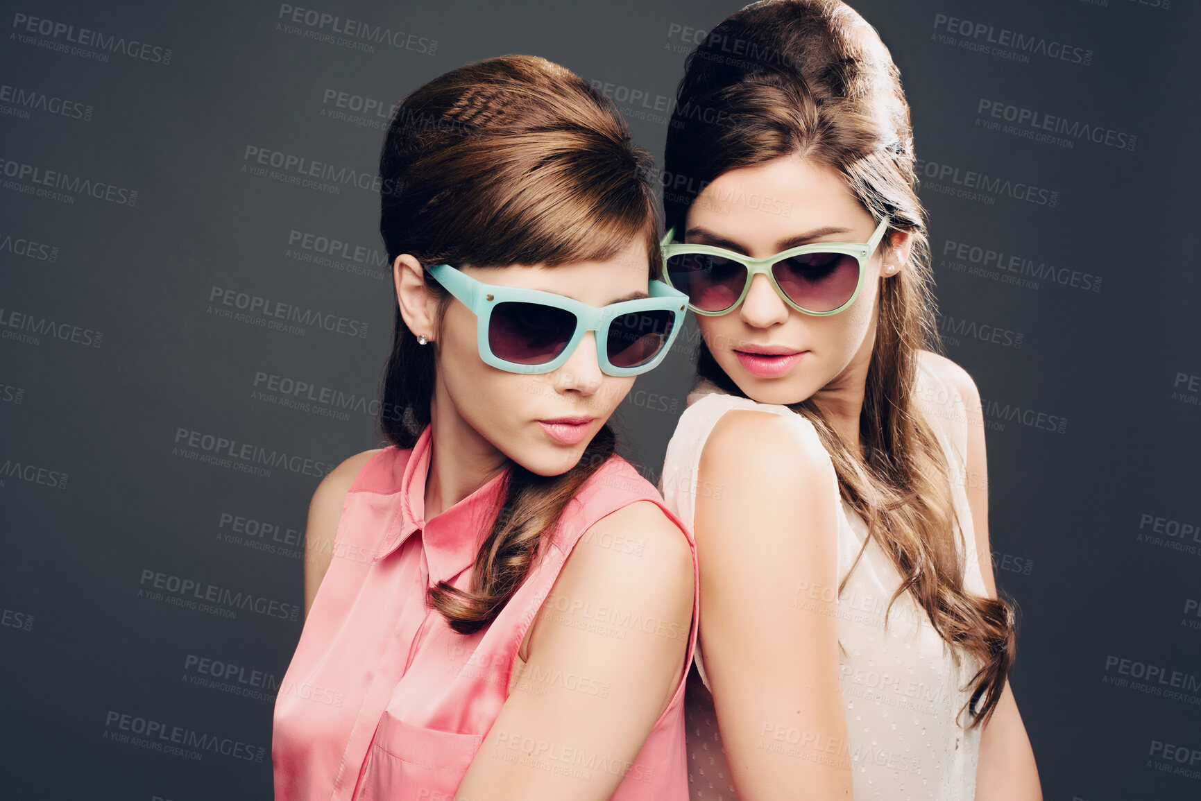 Buy stock photo Fashion, glamour and retro with portrait of women in studio for elegant, pastel and beauty. Sunglasses, confident and cosmetics with female model on dark background for vinatge, beehive and style