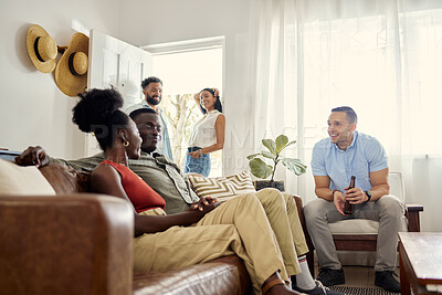 Buy stock photo Shot of a group of close friends gathering at a house