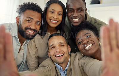 Buy stock photo Shot of a man taking a selfie with a group of friends at home