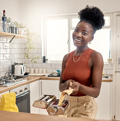 Buy stock photo Shot of a young woman cooking at home
