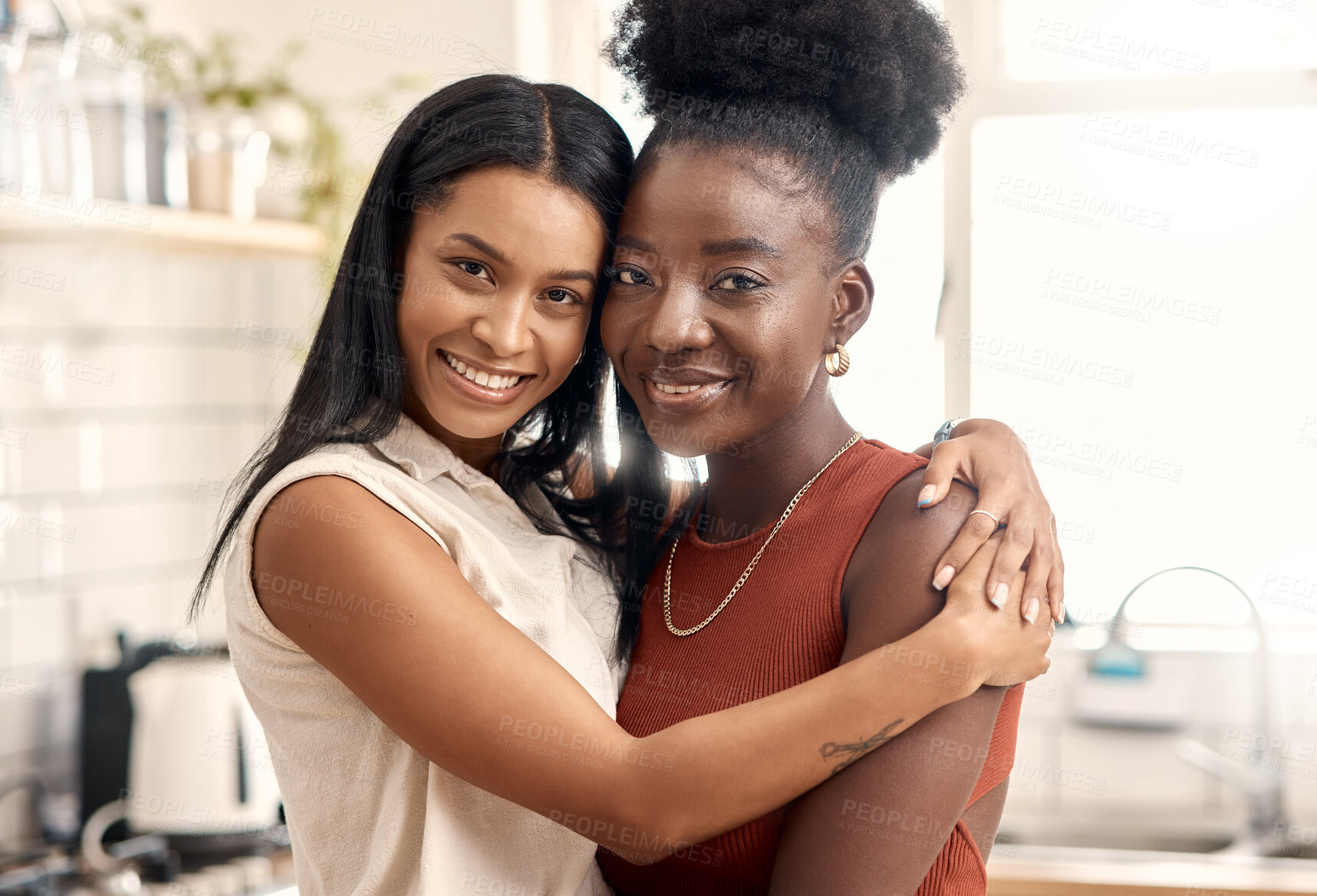 Buy stock photo Shot of two young friends spending time together at home