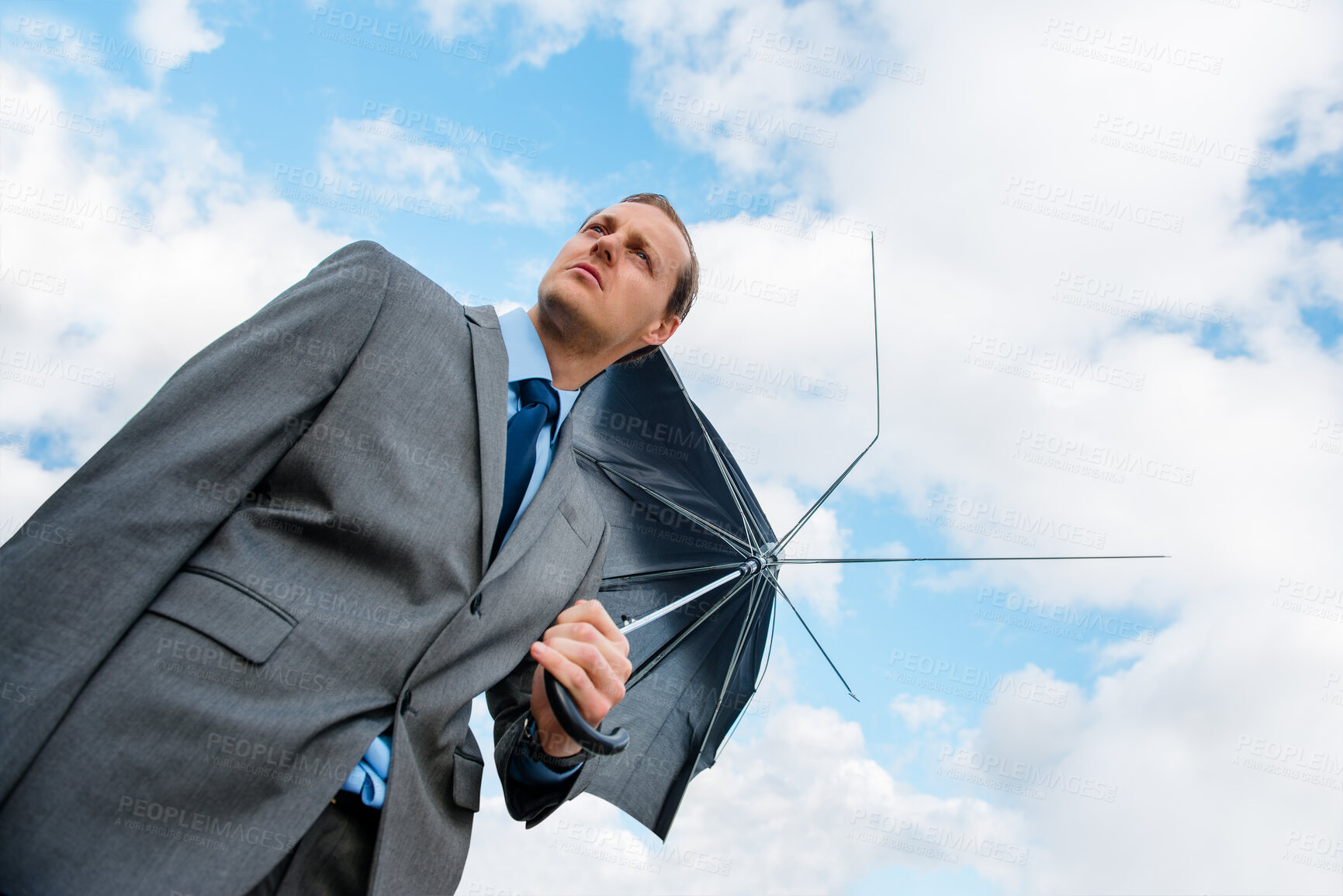 Buy stock photo Businessman, thinking and outdoor with broken umbrella, insurance agent and blue sky for security fail. Male person, stress and anxiety for bankruptcy crisis, professional mistake and low angle