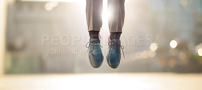 Buy stock photo Formal, shoes and jumping in air outdoor for celebration, success and achievement with lens flare. Business person, feet and legs in closeup outside for victory, ascension and good news as prize 