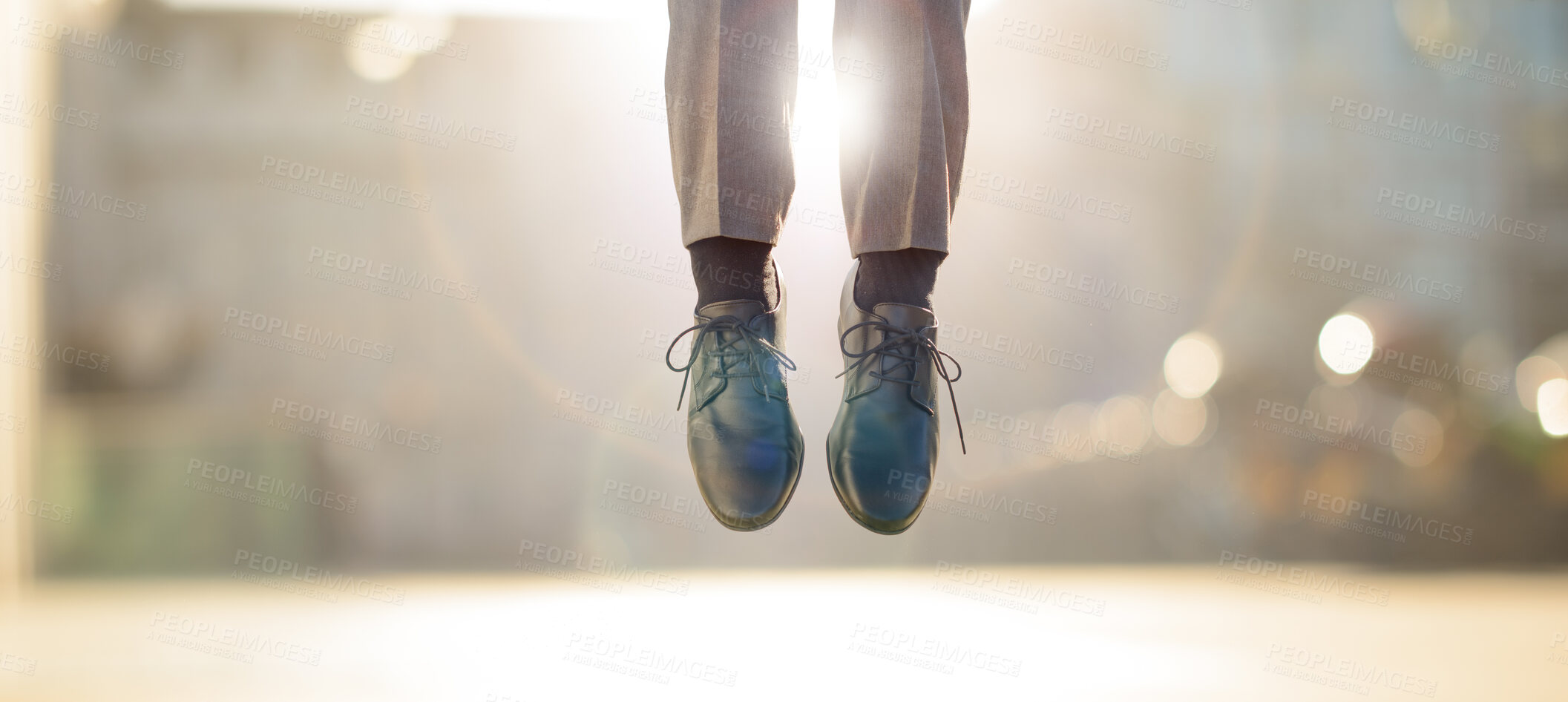 Buy stock photo Formal, shoes and jumping in air outdoor for celebration, success and achievement with lens flare. Business person, feet and legs in closeup outside for victory, ascension and good news as prize 