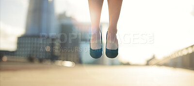 Buy stock photo Feet, woman and floating in air on bridge for celebration, success and achievement with lens flare. Business person, foot and legs in closeup in city for victory, ascend and good news as prize winner