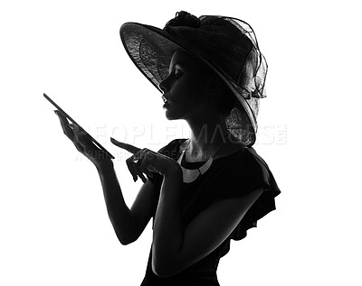 Buy stock photo Woman, tablet and fashion with silhouette in studio for style, art and black dress by white background. Person, model and touchscreen with click, profile and app with vintage hat for social media