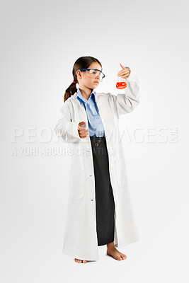 Buy stock photo Studio, flask and child in scientist costume for dress up, growth or development in future healthcare career. Science, pretend or girl in medical lab clothes for professional job on white background