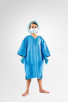 Buy stock photo Studio, portrait and child in surgeon costume for dress up, growth or development in future healthcare career. Mask, play or girl in in doctor clothes for medical professional job on white background