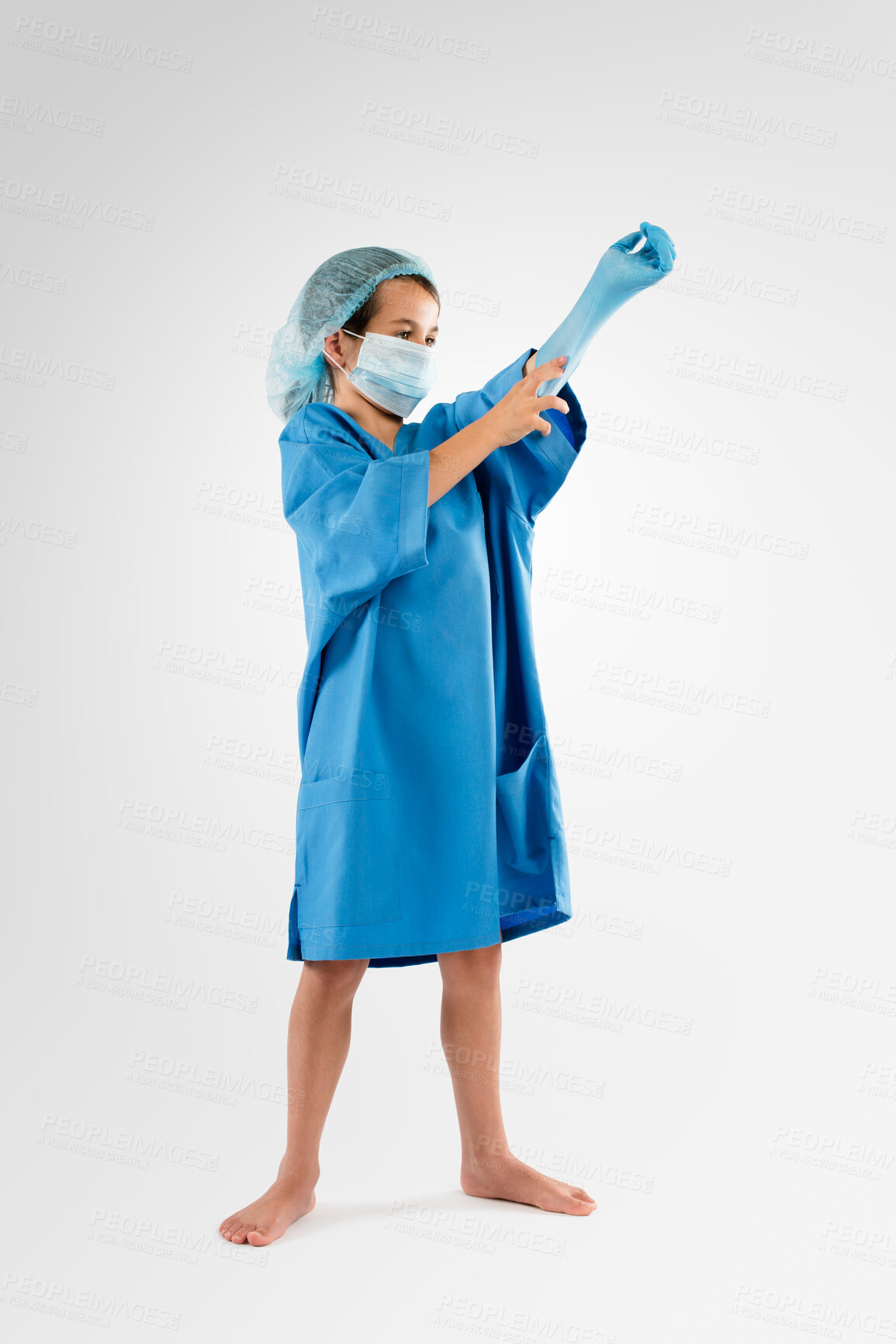 Buy stock photo Studio, mask and child in surgeon costume for dress up, growth or development in future healthcare career. Gloves, play and girl in in doctor clothes for medical professional job on white background