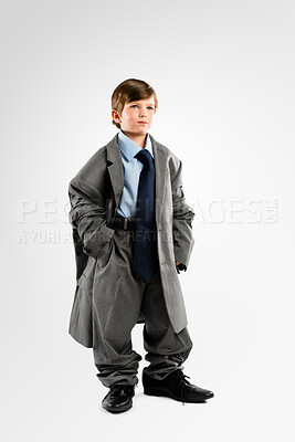 Buy stock photo Child, thinking and business clothes in studio for childhood growth, future and ambition with vision. Male kid, idea and corporate attire on white background for development, dressing and family heir