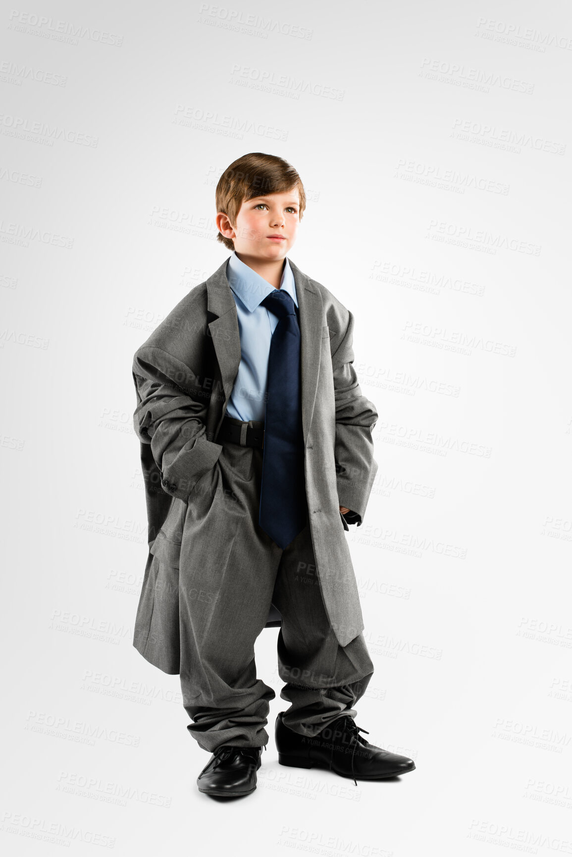 Buy stock photo Child, thinking and business clothes in studio for childhood growth, future and ambition with vision. Male kid, idea and corporate attire on white background for development, dressing and family heir