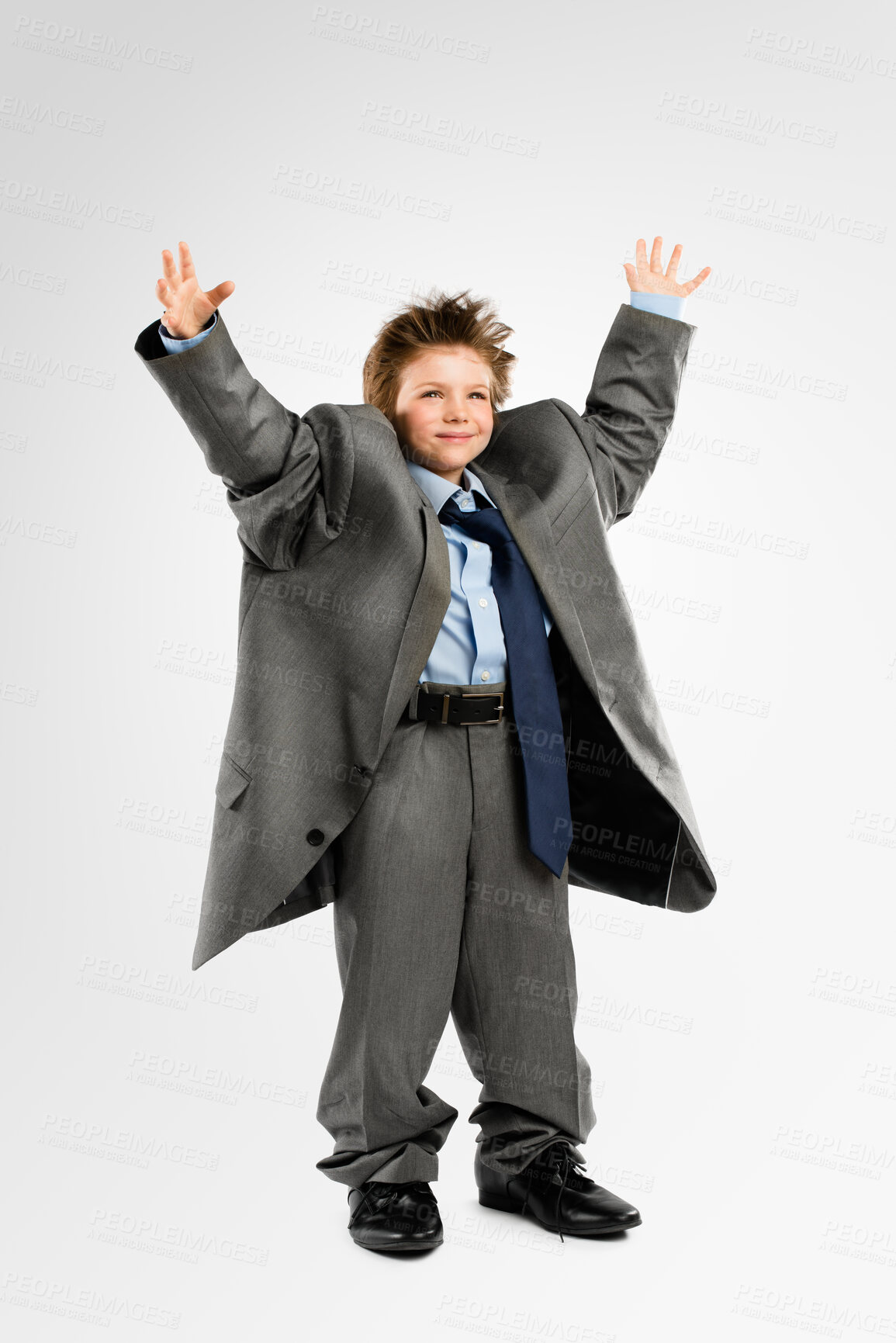Buy stock photo Boy, celebrate and business clothes in studio for childhood growth, future and ambition with smile. Male kid, success and corporate attire on white background for development, happy as family heir