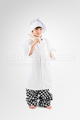 Buy stock photo Little boy, chef or roller with hat in studio for dress up, dream or ambition on a white background. Child, kid or junior cook with rolling pin, uniform or equipment for baking, art or culinary skill