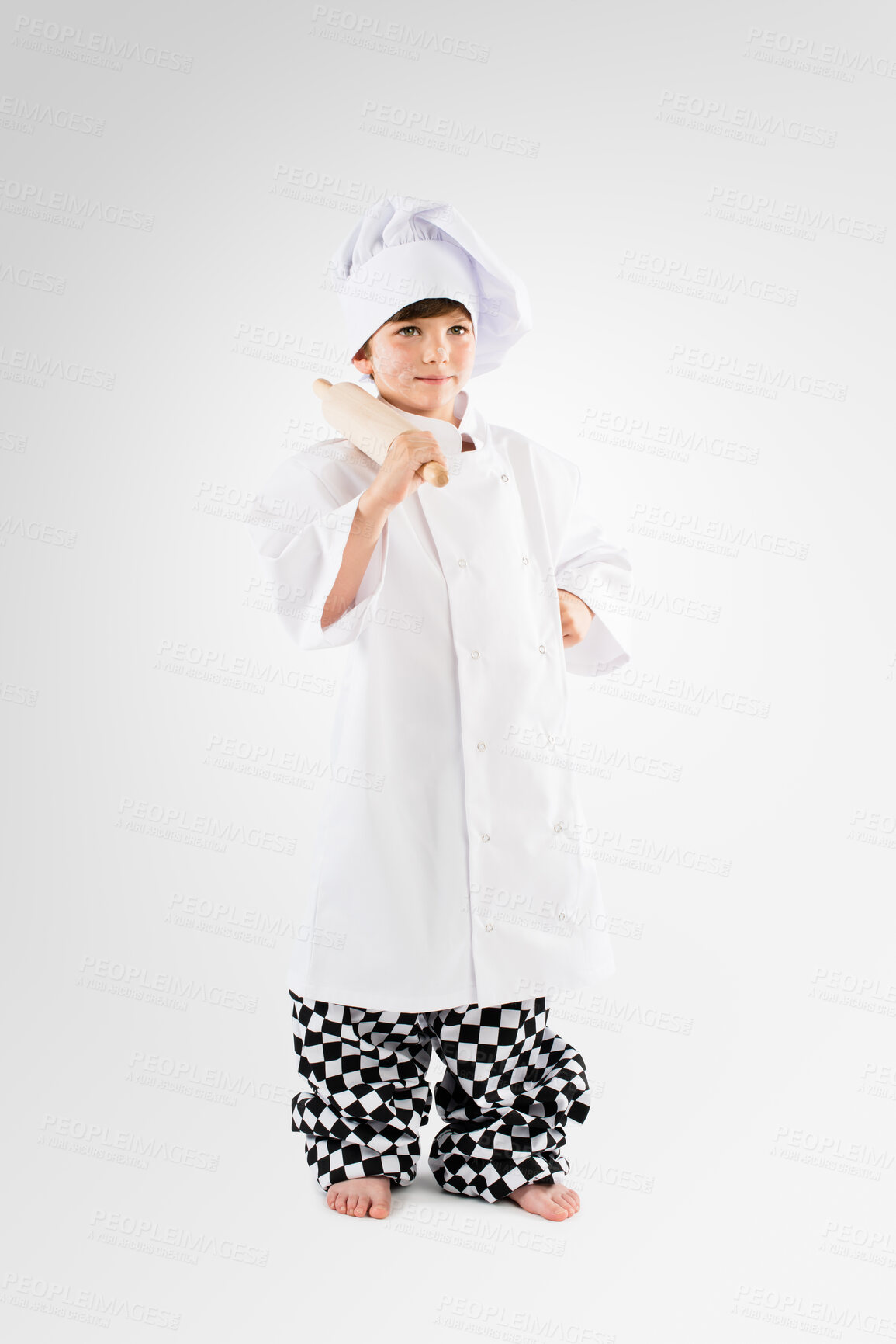 Buy stock photo Little boy, chef or roller with hat in studio for dress up, dream or ambition on a white background. Child, kid or junior cook with rolling pin, uniform or equipment for baking, art or culinary skill