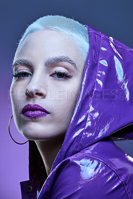 Buy stock photo Studio shot of a beautiful woman woman wearing a purple jacket and purple lipstick