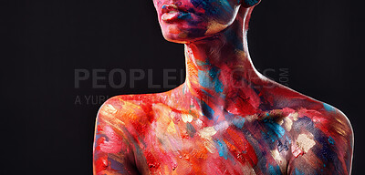 Buy stock photo Cropped shot of an unrecognisable woman posing alone in the studio with paint on her body