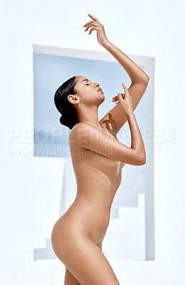 Buy stock photo Shot of an attractive young women posing nude outside