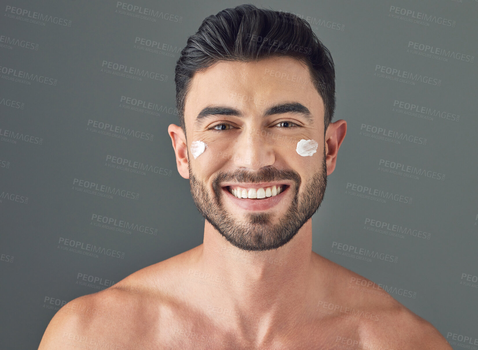 Buy stock photo Skincare, portrait or man with moisturizer, smile and spf protection for skin health. Dermatology, happy and male person with hydration cream, sunscreen lotion or facial care on studio background.